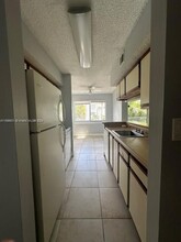 5686 Rock Island Rd, Unit TAMARAC CONDO in Tamarac, FL - Building Photo - Building Photo