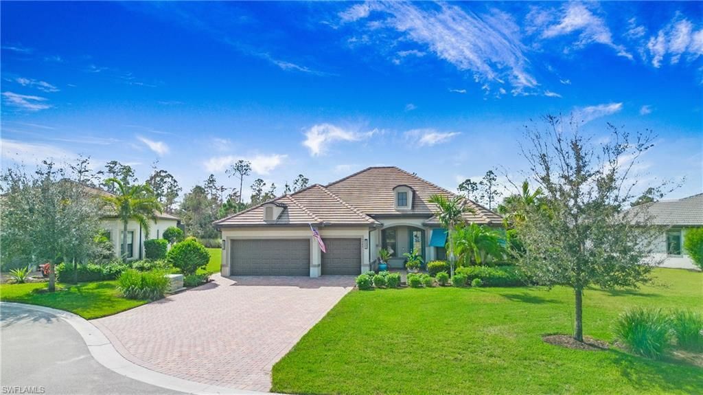 7788 Winding Cypress Dr in Naples, FL - Building Photo