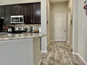 868 Old Windsor Way in Spring Hill, FL - Building Photo - Building Photo