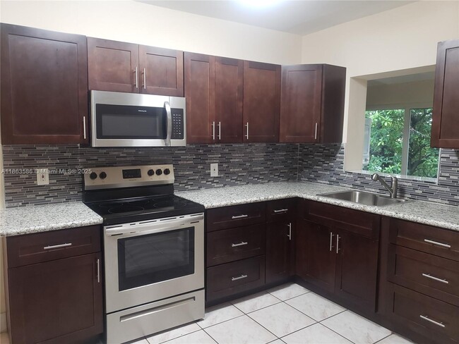 property at 3640 SW 14th St