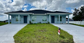 2409-2411 Churchill Ave N, Unit 2409 in Lehigh Acres, FL - Building Photo