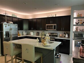 6974 Halton Park Ln in Coconut Creek, FL - Building Photo - Building Photo