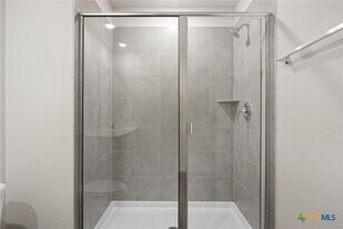 12811 Village Spun Plz in Mustang Ridge, TX - Building Photo