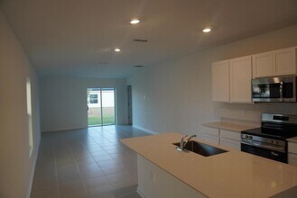 3448 Chinotto Dr in Lake Alfred, FL - Foto de edificio - Building Photo