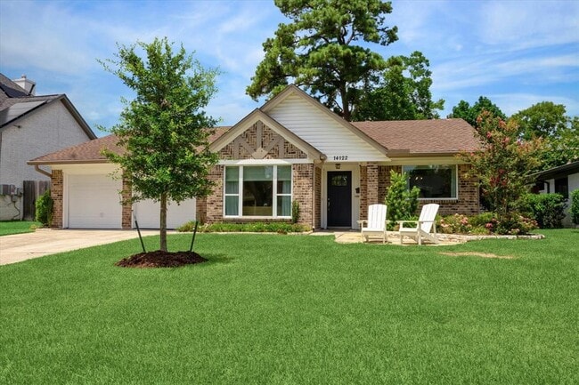 property at 14122 Queensbury Ln