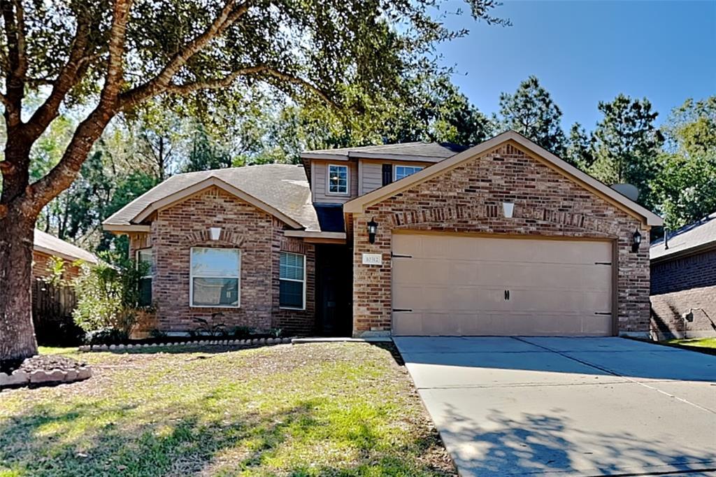 10312 Stone Gate Dr in Conroe, TX - Building Photo