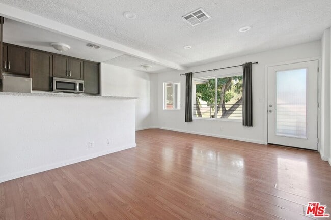 property at 6612 De Longpre Ave