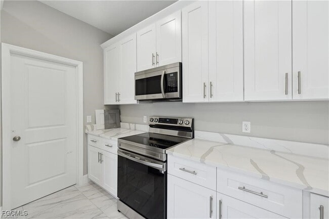 1040 Milwaukee Blvd in Lehigh Acres, FL - Building Photo - Building Photo