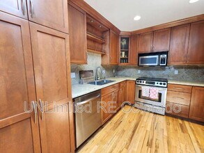 8308 E Lehigh Dr in Denver, CO - Building Photo - Building Photo