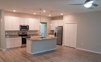 383 SE Cork Rd in Port St. Lucie, FL - Building Photo - Building Photo
