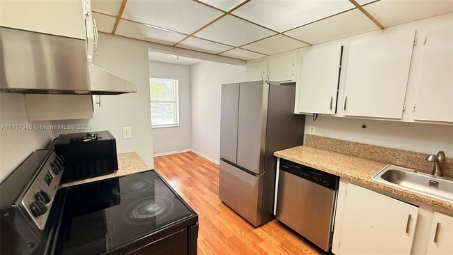 property at 5987 Forest Hill Blvd