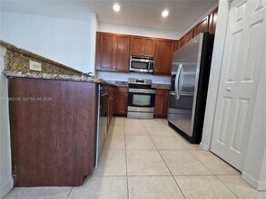 9070 Preston Pl in Tamarac, FL - Building Photo - Building Photo