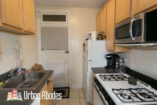 1253 W Henderson St, Unit A02C in Chicago, IL - Foto de edificio