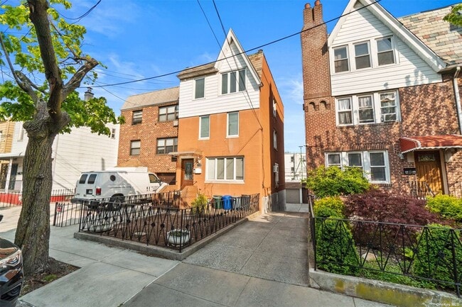 property at 32-33-33 46th St