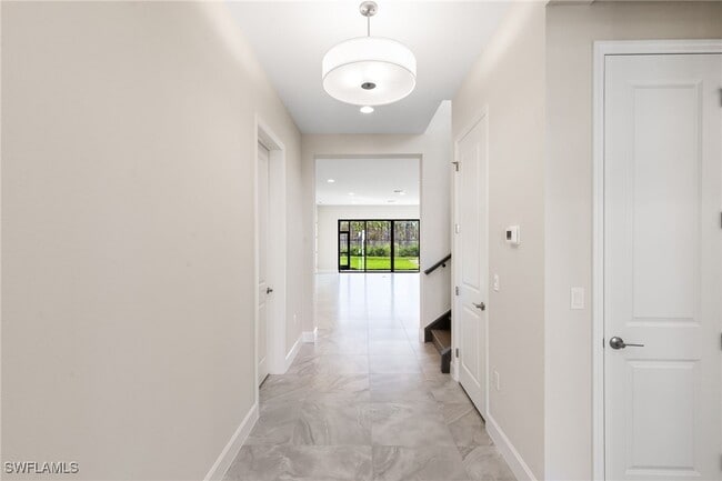 21041 Teak Tree Ter in Estero, FL - Building Photo - Building Photo