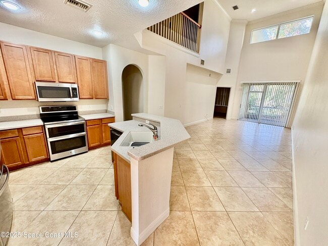 242 Tin Roof Ave in Cape Canaveral, FL - Building Photo - Building Photo