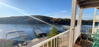 28 Wheel House Ct. in Village Of Four Seasons, MO - Building Photo