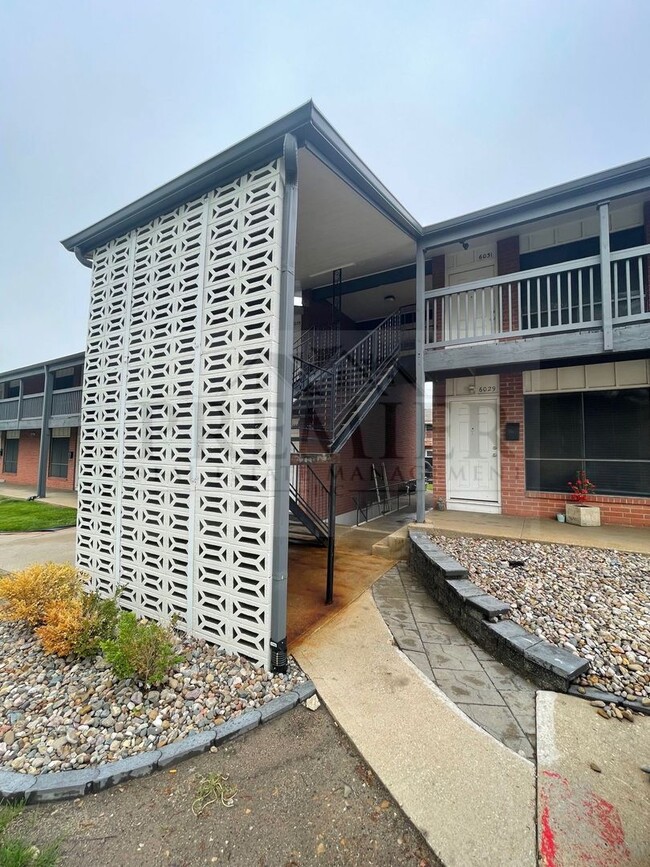 property at 6055 Barton Ave