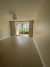1743 Village Blvd-Unit -107 in West Palm Beach, FL - Building Photo - Building Photo