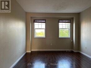 233 Rouge River Dr in Toronto, ON - Building Photo - Building Photo