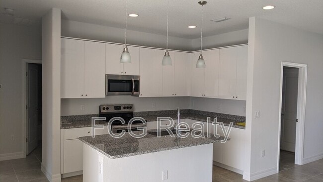 48 Orchid Ln in Poinciana, FL - Building Photo - Building Photo