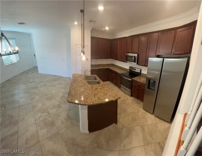 10100 Tin Maple Dr in Estero, FL - Building Photo - Building Photo