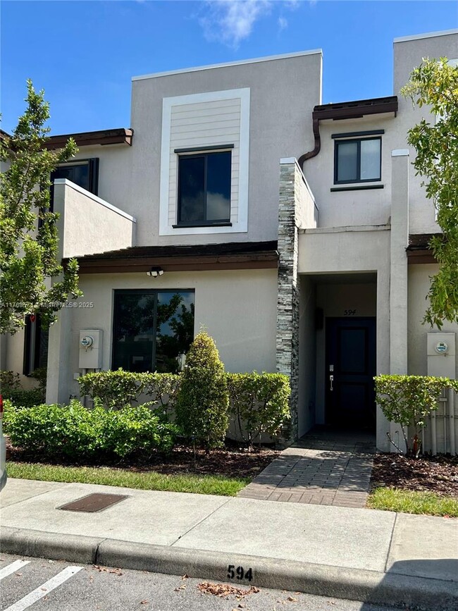 property at 594 NE 207th St