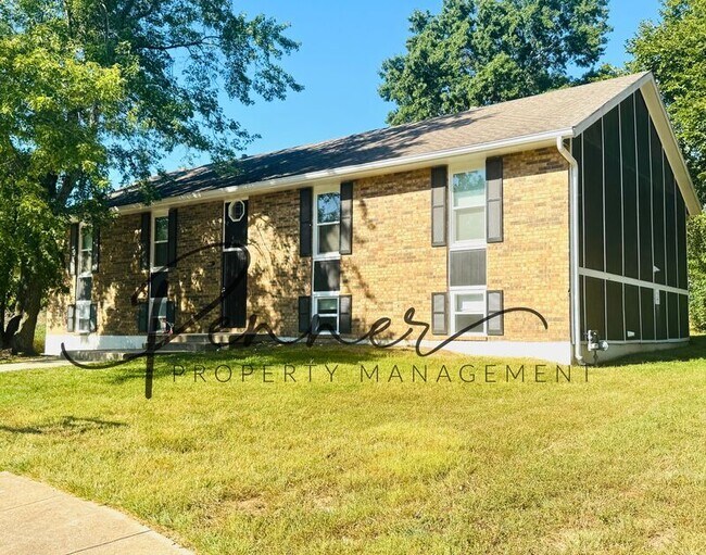 property at 704 NE Ball Dr