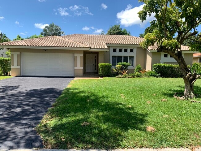 9840 NW 28th Ct in Coral Springs, FL - Foto de edificio - Building Photo