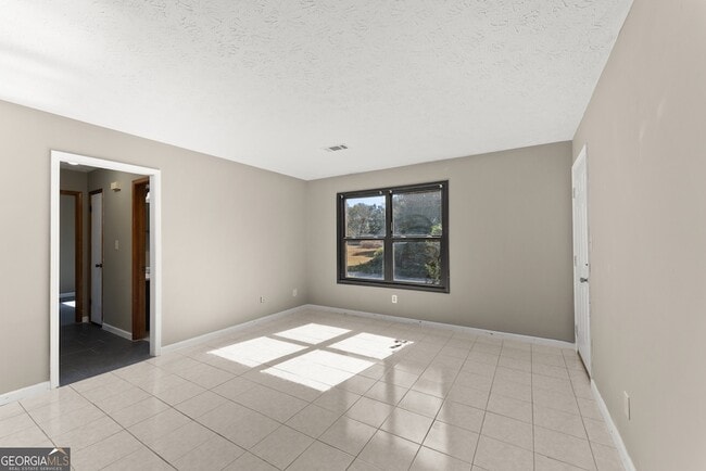 59 Sloan St, Unit A in Mcdonough, GA - Foto de edificio - Building Photo