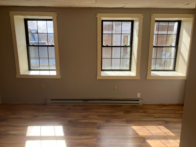100 E Main St-Unit -Apt 2 in Millheim, PA - Building Photo - Building Photo