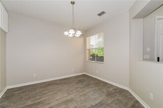 10120 N Golden Elm Dr in Estero, FL - Building Photo - Building Photo