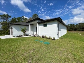 615 Addison St E in Lehigh Acres, FL - Building Photo - Building Photo