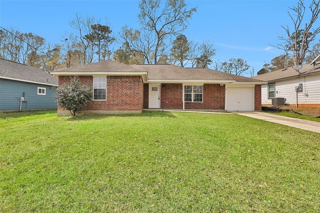 14975 Crockett Rd in Willis, TX - Building Photo - Building Photo