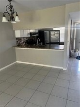 2660 Kings Lake Blvd in Naples, FL - Foto de edificio - Building Photo