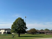 Riverside Apartments and Townhomes in Camanche, IA - Foto de edificio - Building Photo