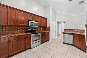 3718 SW Masilunas St in Port St. Lucie, FL - Building Photo - Building Photo