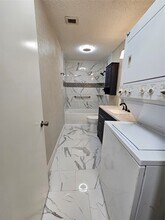 10047 Westpark Dr in Houston, TX - Building Photo - Building Photo