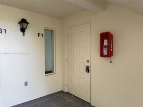 1101 Green Pine Blvd, Unit 0061 in West Palm Beach, FL - Building Photo - Building Photo