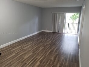 8540 N Sherman Cir, Unit 206 in Miramar, FL - Building Photo - Building Photo
