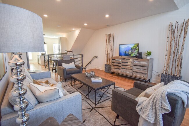 Depot 16 Flats and Townhomes in Bentonville, AR - Building Photo - Building Photo