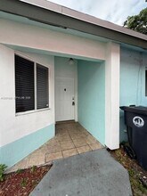 1034 W Jasmine Ln in North Lauderdale, FL - Building Photo - Building Photo