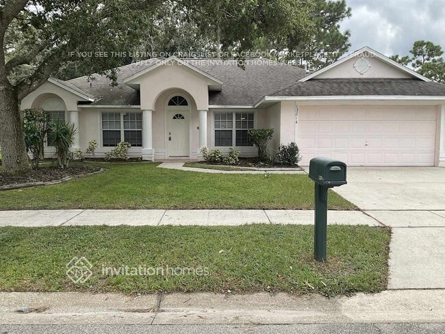 property at 13814 Riverpath Grove Dr