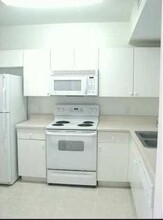 1095 Golden Lakes Blvd-Unit -912 in West Palm Beach, FL - Building Photo - Building Photo