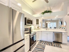 14530 Red Fox Run-Unit -215 in Naples, FL - Building Photo - Building Photo