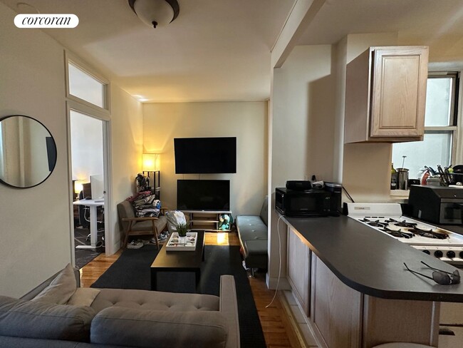 property at 114 E 1st St