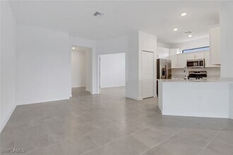19541 Hinkley Dr in Estero, FL - Building Photo - Building Photo