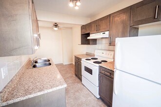 Millcreek Village in Edmonton, AB - Building Photo - Building Photo