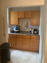 32 E Cottage St, Unit 1 in Dorchester, MA - Foto de edificio - Building Photo