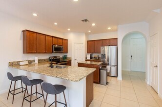 10349 Wellington Parc Dr in Wellington, FL - Building Photo - Building Photo